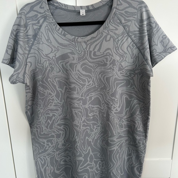 lululemon athletica Tops - lululemon athletica Gray Swirl Short Sleeve Tee. Never been worn but no tags.